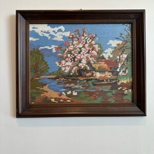 Vintage Completed Needlepoint Art Framed Landscape Cabin Boat Trees Water Clouds